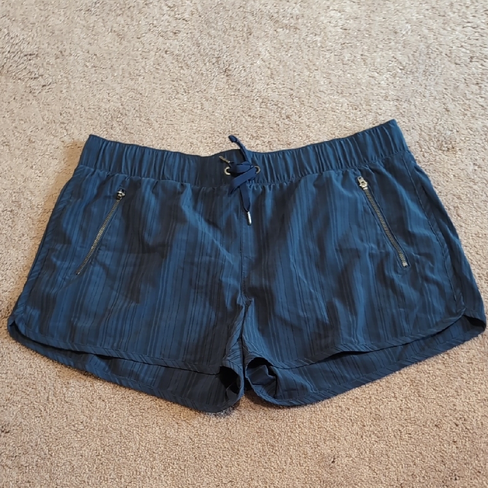 Athleta Dark Blue Athletic Shorts with Zippered Pockets